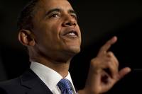 Barack Obama apara decizia Fed de a tipari dolari