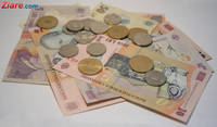 Curs valutar: Euro scade sub pragul de 4,5 lei