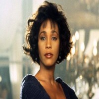 Whitney Houston a murit