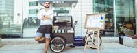 The Coffee Guy: Cafeaua pe roti, la usa biroului tau